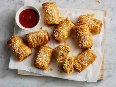 Sausage rolls in a basket for footy finals parties