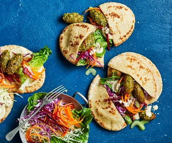 Falafel wraps with hummus and slaw