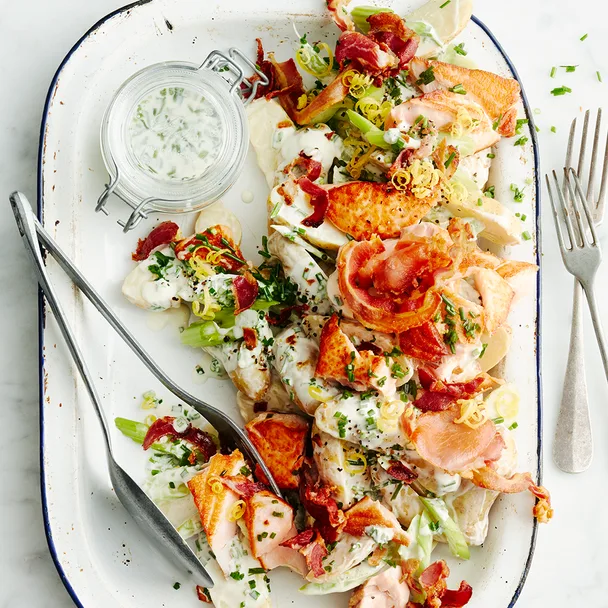 Aerial view of a platter of zesty yoghurt potato salad.