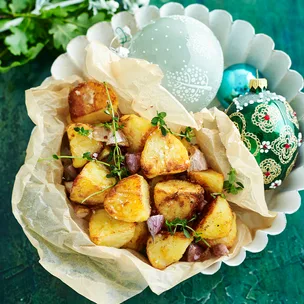 Small bowl of duck fat potatoes.