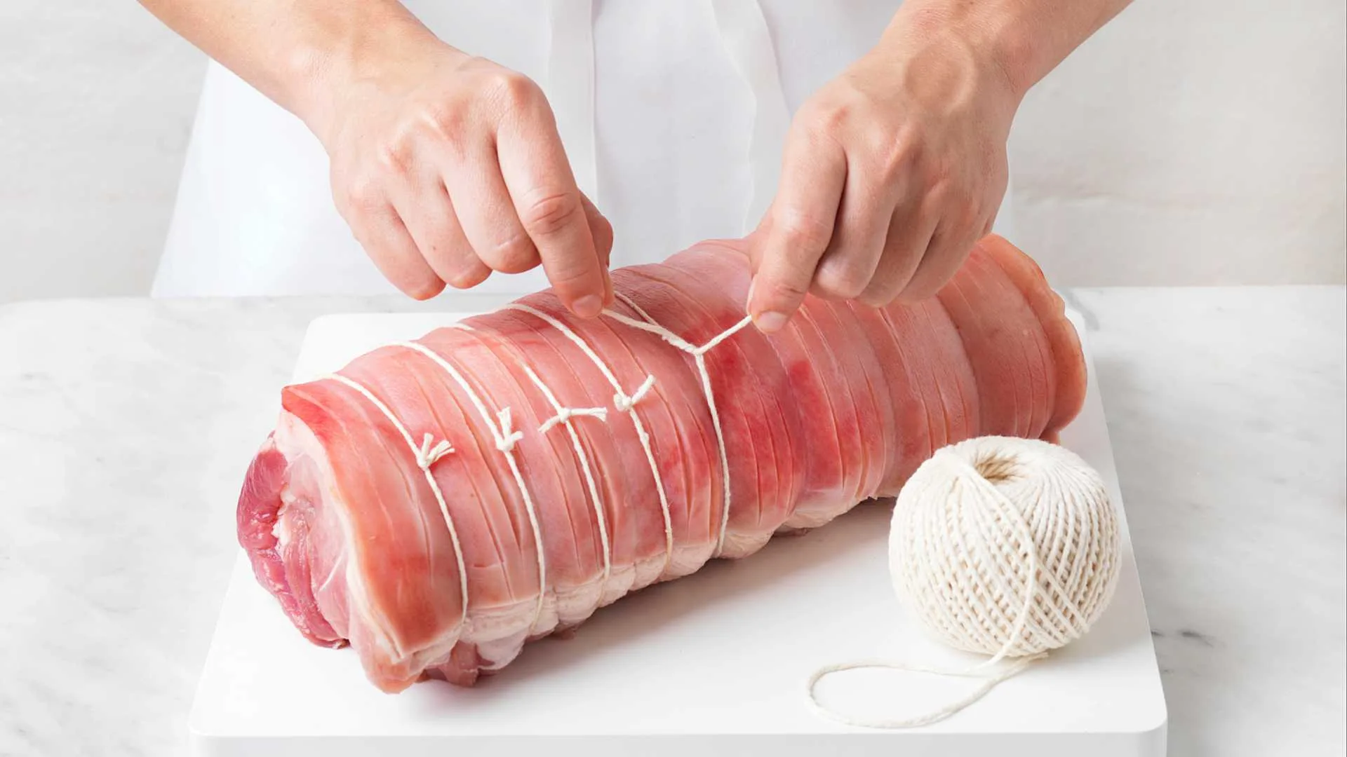 Secure pork loin with string
