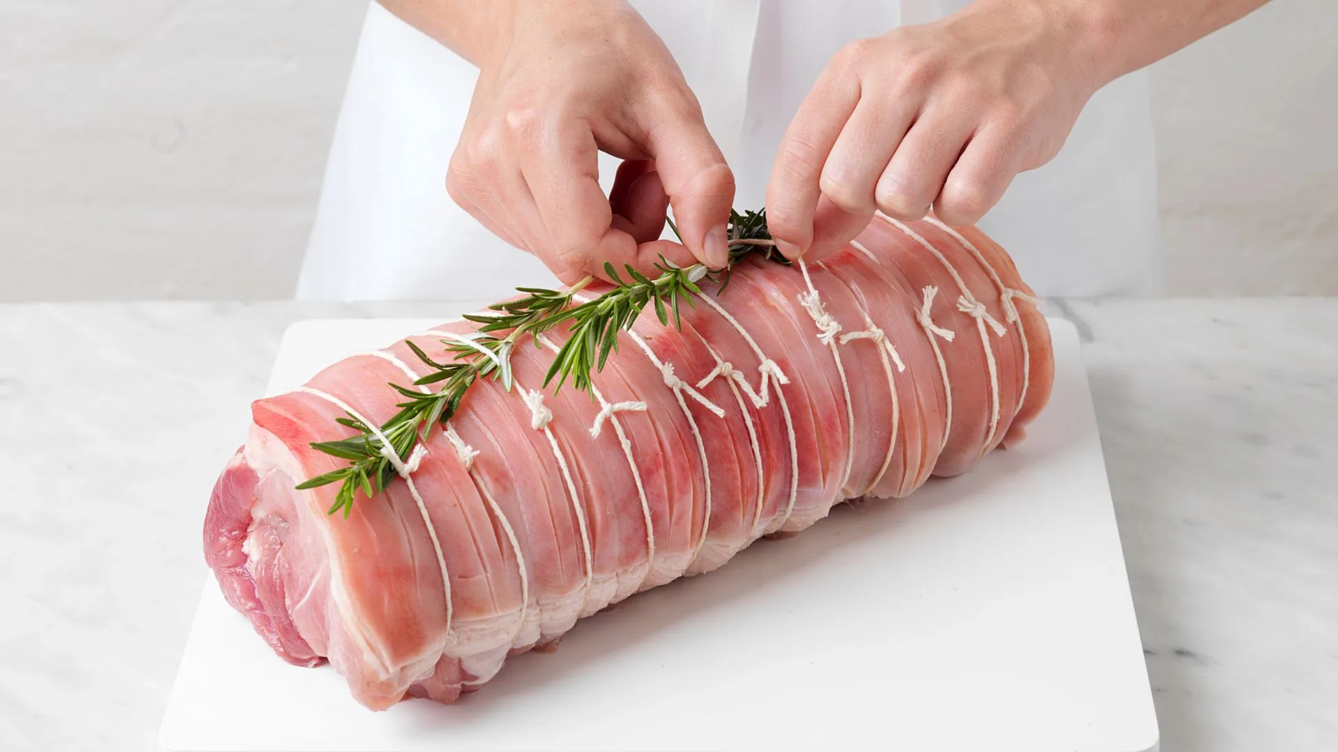 Slide rosemary under under the string