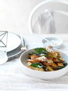 Duck fat potatoes with homemade chicken salt in a bowl.