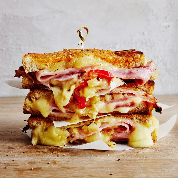 ham, pineapple and cheese toastie, sliced in half and stacked