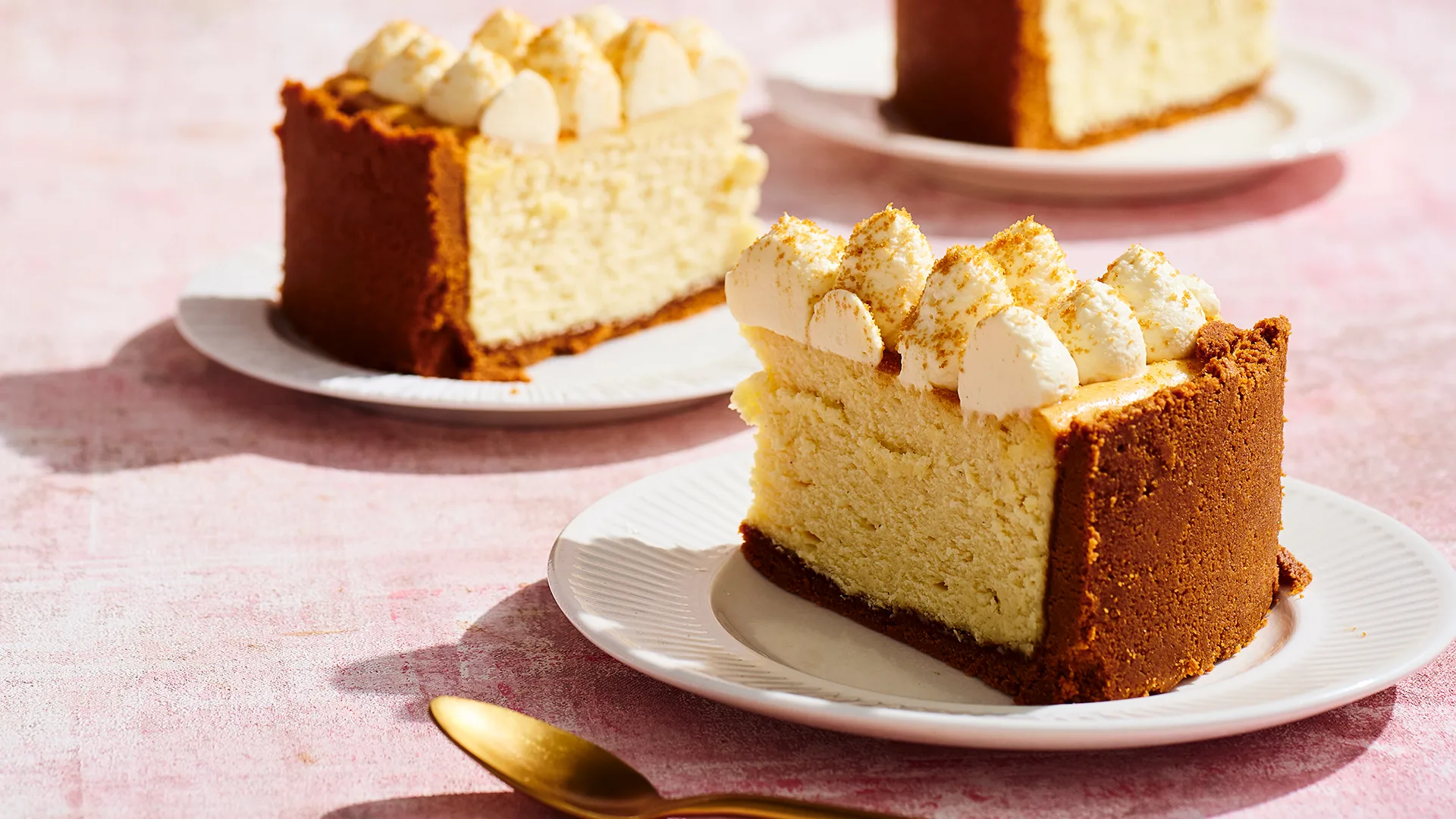 Slices of white chocolate biscoff cheesecake