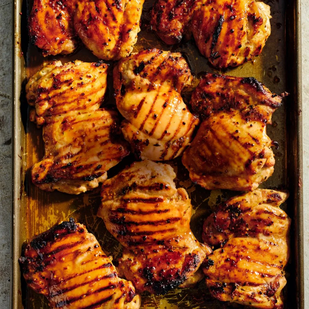 Close of up barbecued chicken thigh fillets