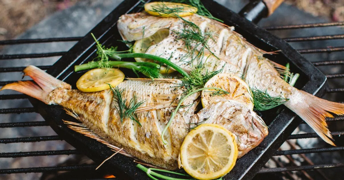 Campfire whole snapper and potato wedges
