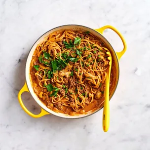 Beef stroganoff in a yellow pan