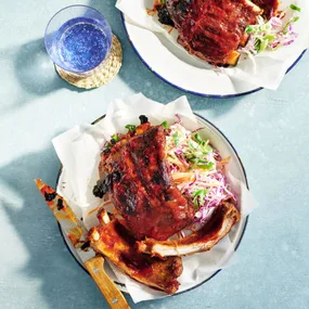 American-style BBQ pork ribs with coleslaw plated