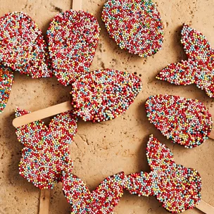 Chocolate freckles in the shape of Easter eggs and chocolate bunnies.
