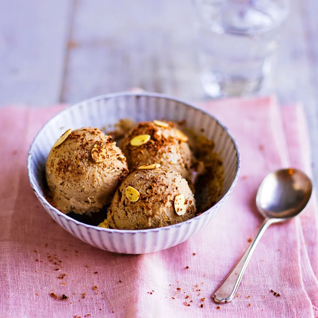 Bowl of homemade banana ice-cream with peanut butter