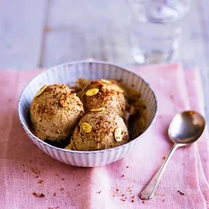 Bowl of homemade banana ice-cream with peanut butter