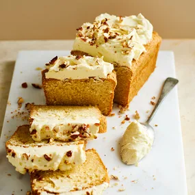 Brown butter loaf cake cut into slices.