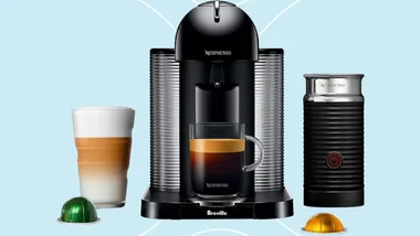 Black Nespresso coffee pod machine with pods