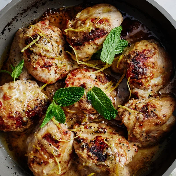 8 chicken breasts cooked in a skillet with tahini, lemon and mint.