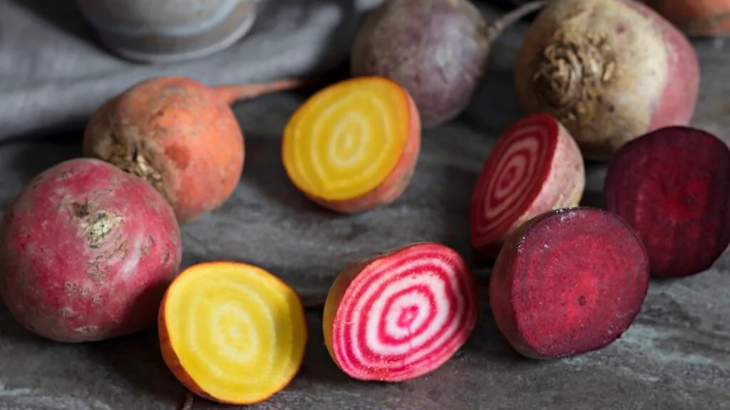 Different varieties of beetroot be colourful when cut open.