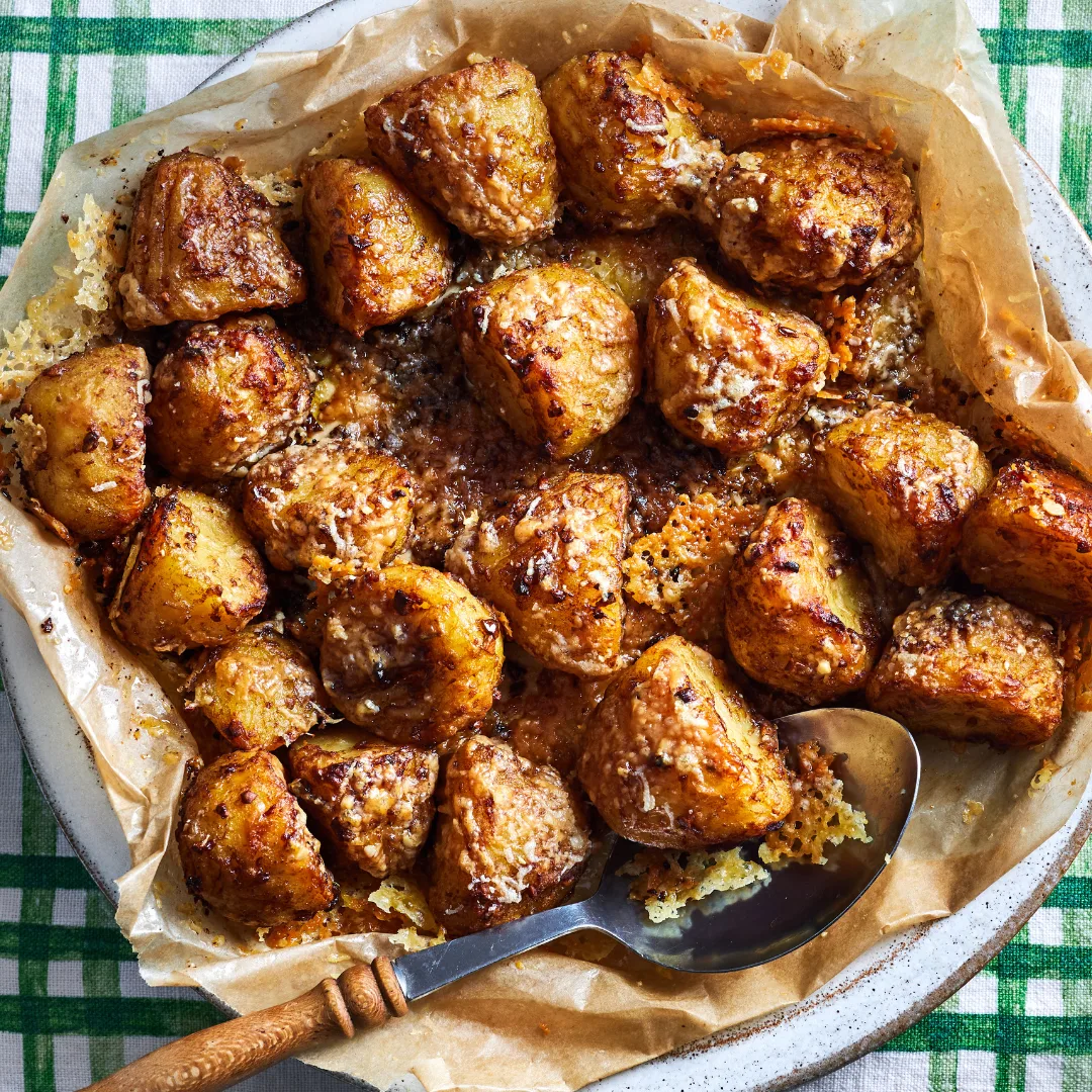 A plate full of roast potatoes