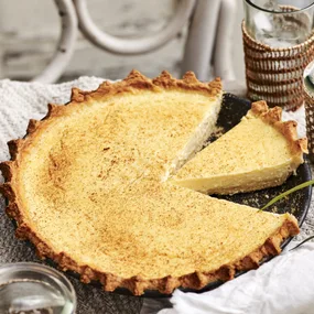 custard tart with a slice cut out