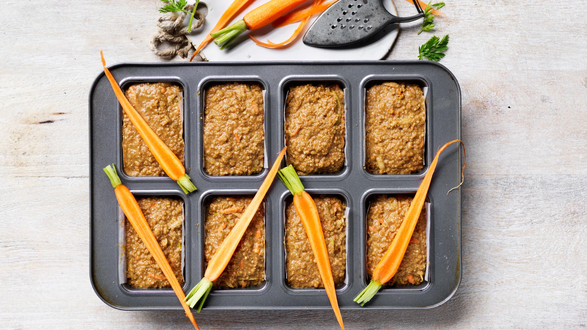 Top each with a baby carrot half, trimmed to fit