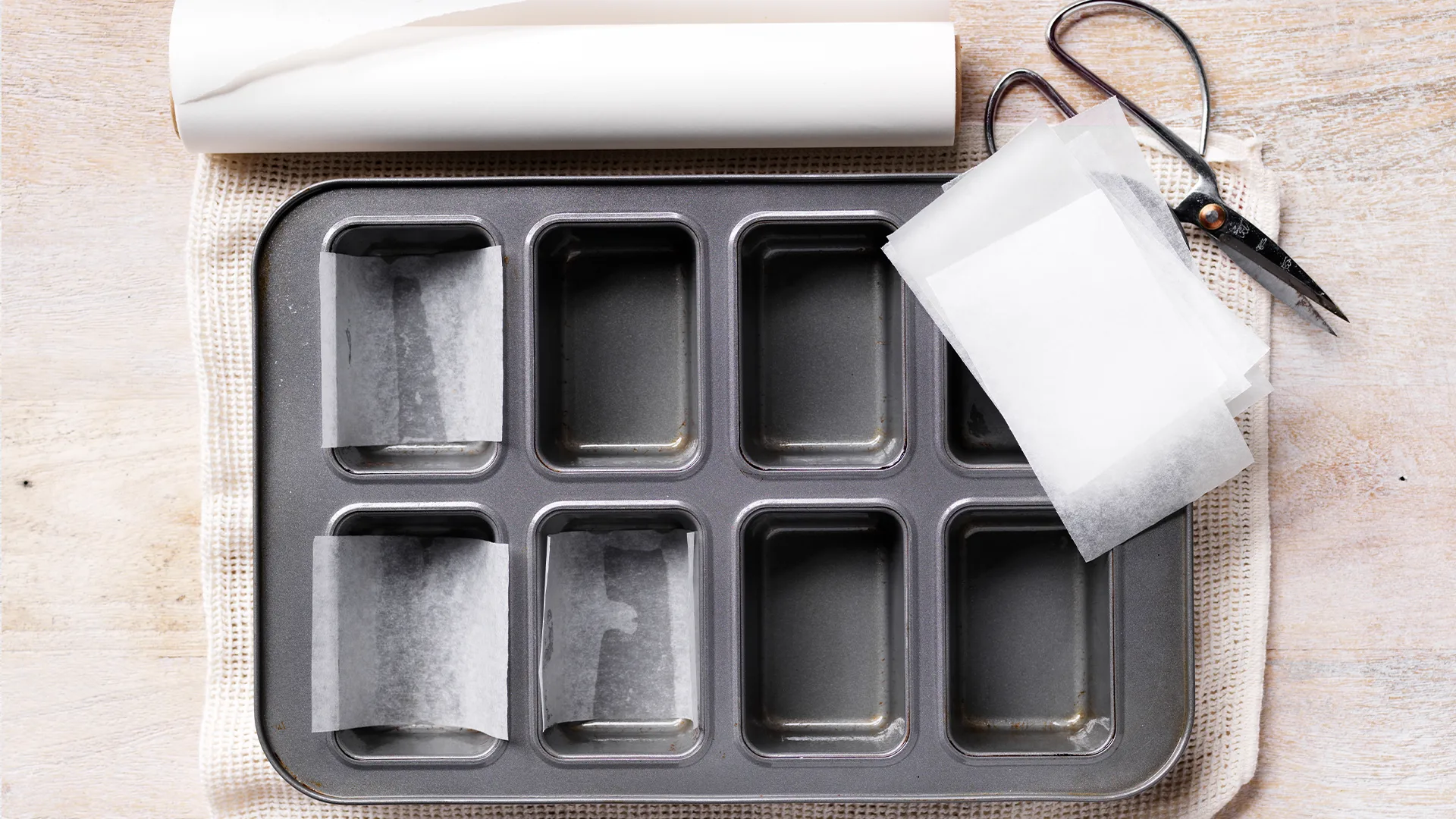 Grease an 8-hole (¾-cup/180ml) mini loaf pan; line bases and sides with baking paper.
