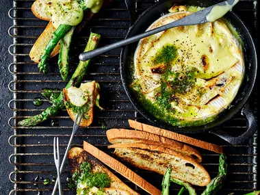 Baked brie fondue cooked on the BBQ served with grilled vegetables and ciabatta bread