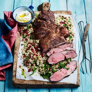 Butterflied leg of lamb with pomegranate pearl barley