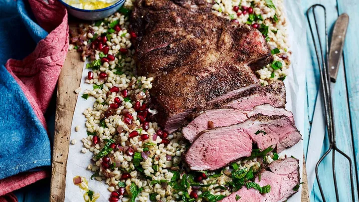 Butterflied leg of lamb with pearl barley salad & tahini yoghurt sauce