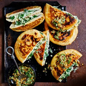 Charred flatbread with spanakopita filling