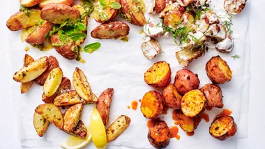 roast potatoes on a board, four different flavours