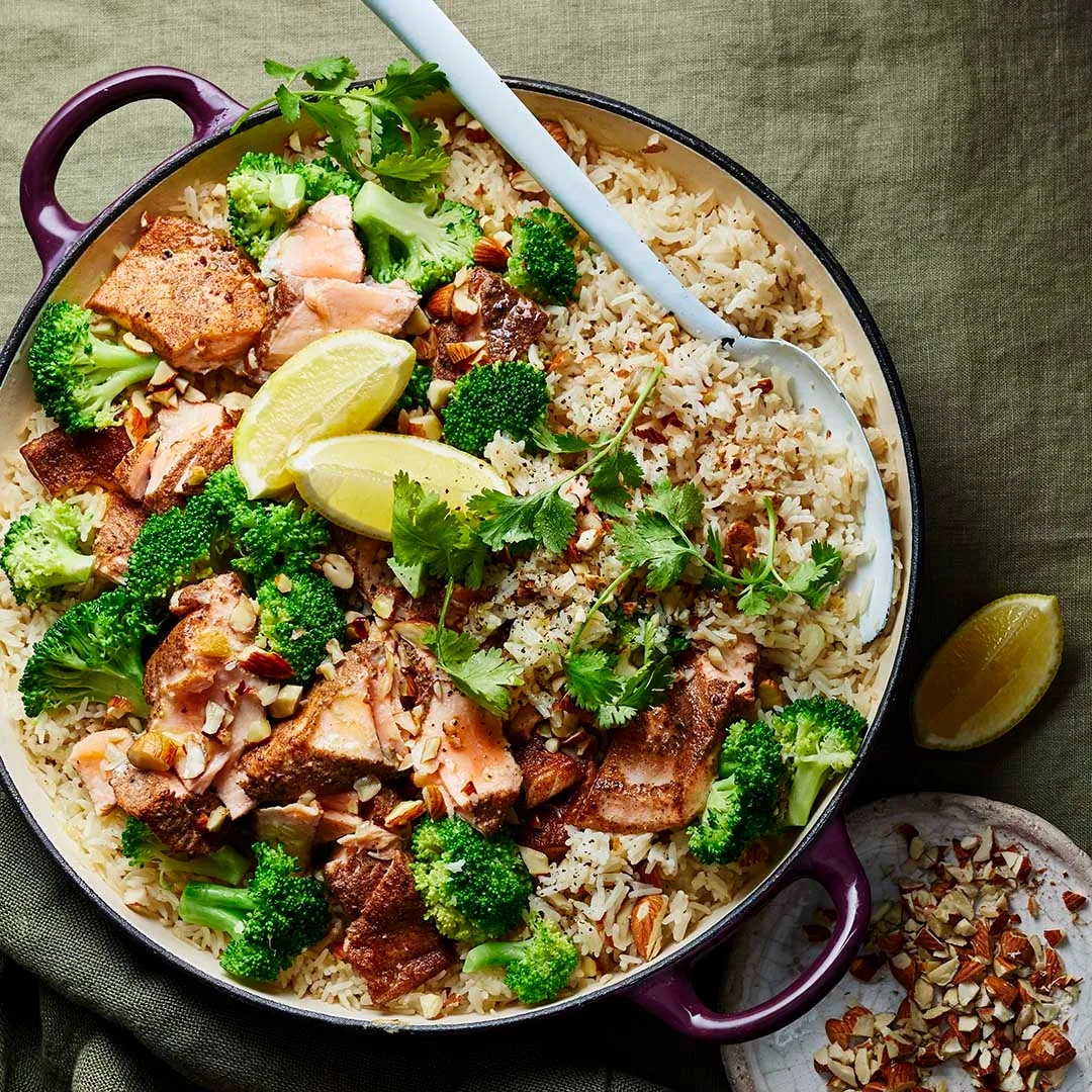 salmon broccoli and rice in a pan