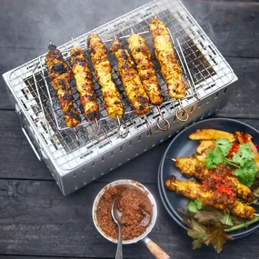 Barbecued chicken satay skewers