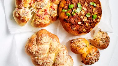 four types of air fryer bread on baking paper