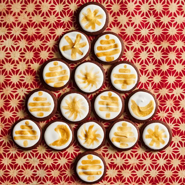 spiced gingerbread biscuits shaped into a Christmas tree