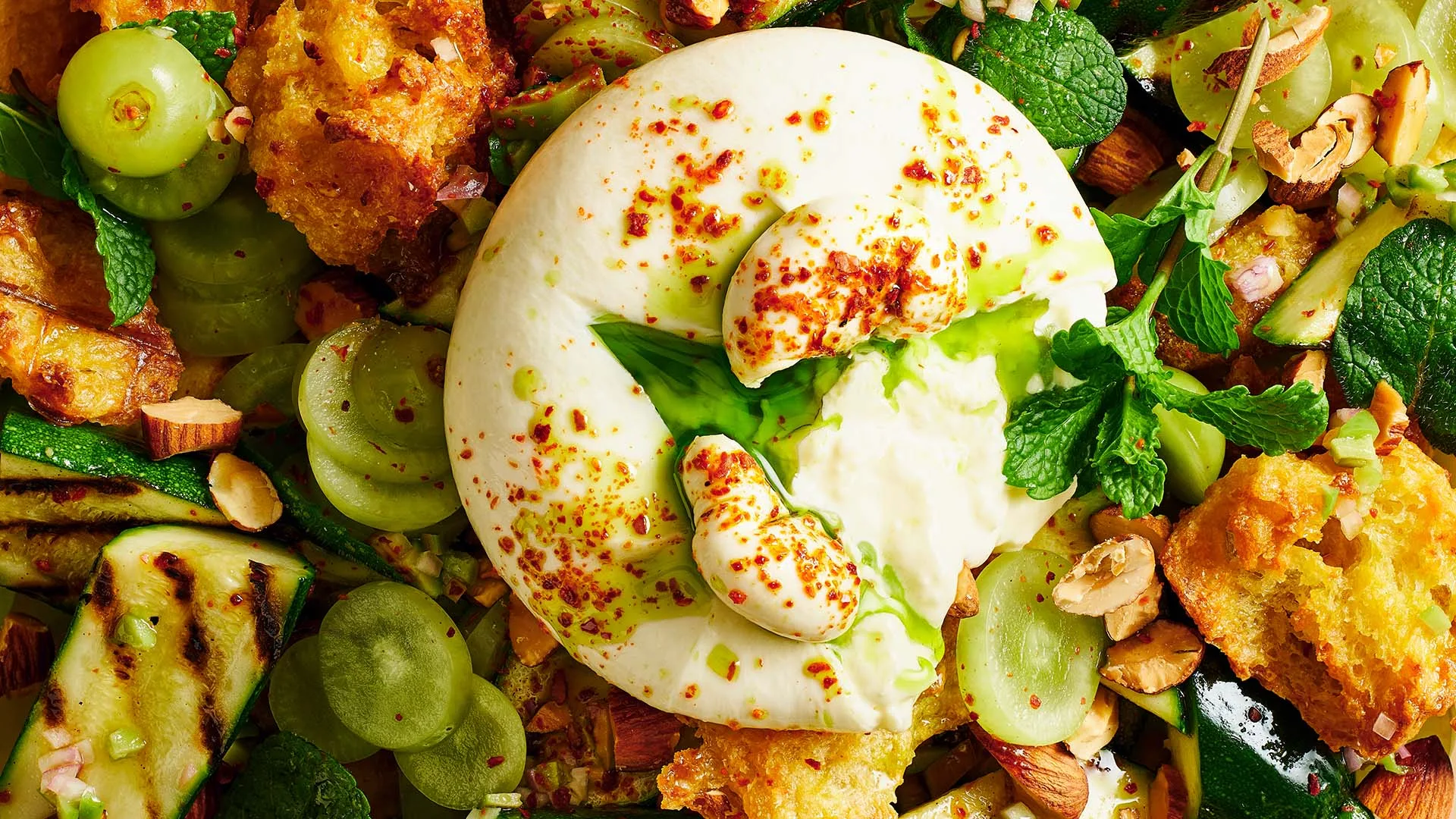 Burrata salad with crunchy bread, zucchini & mint dressing