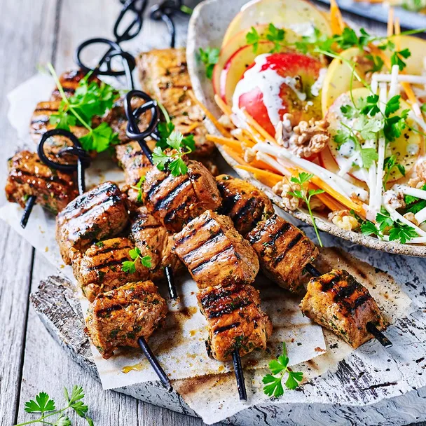 Sweet & spicy pork skewers served with crisp apple, carrot & celeriac salad.