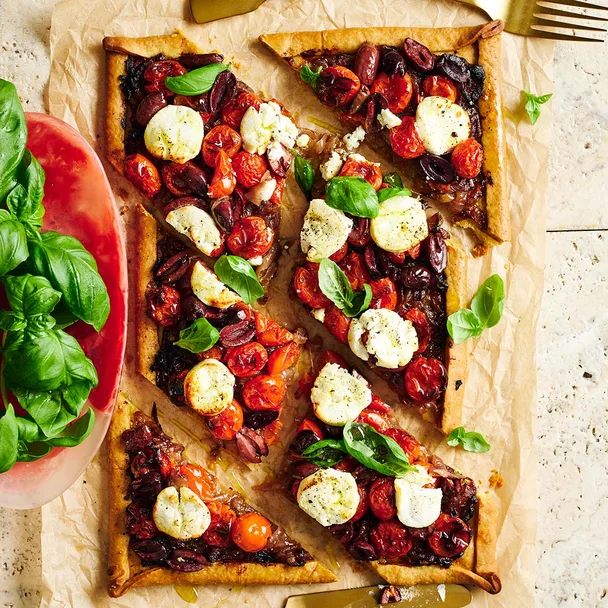 Tomato & goat&rsquo;s cheese pissaladi&egrave;re