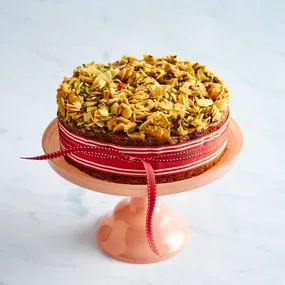 one pan fruit cake on a cake stand