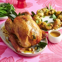 Lemony roast whole turkey with macadamia stuffing wreath