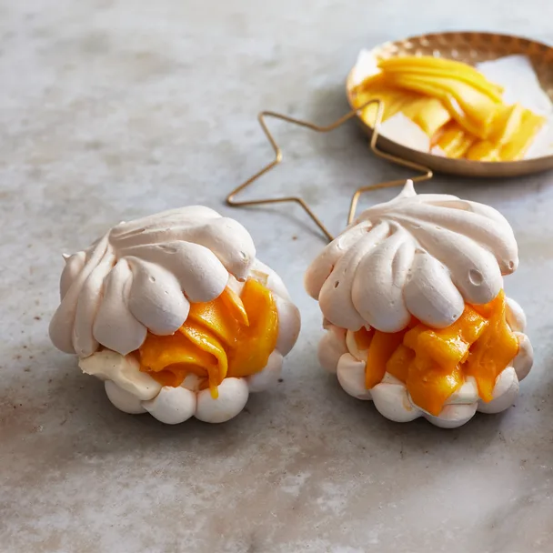 Mini mango pavlova shells