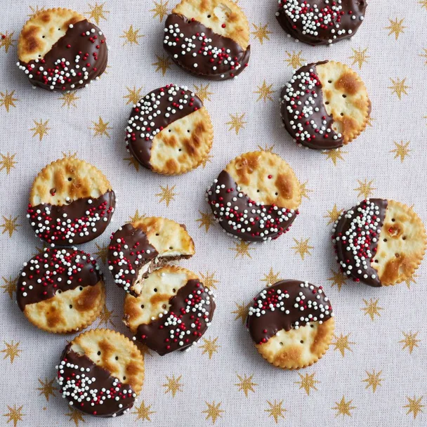 Salted caramel biscuits made from Jatz and dipped in chocolate with sprinkles