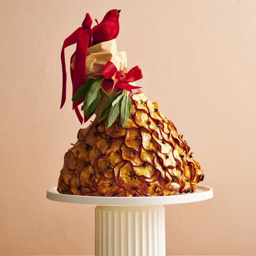 Glazed Christmas ham, a half ham on a serving platter.