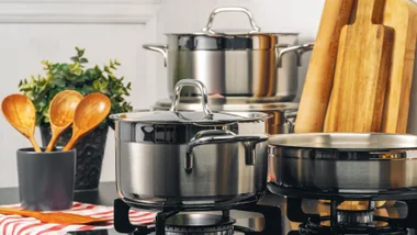 Clean saucepan on a gas stove in kitchen