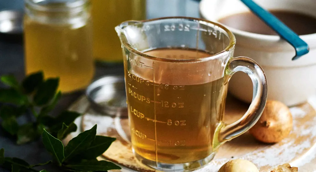 Chicken stock in a jug