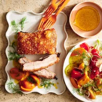 Crispy pork belly with apricot, tomato and fennel salad