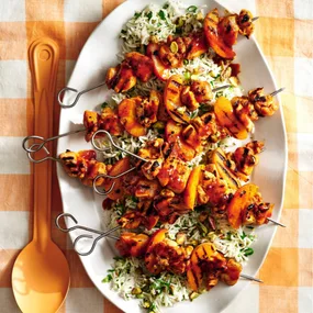 Apricot chicken skewers with nutty herby rice