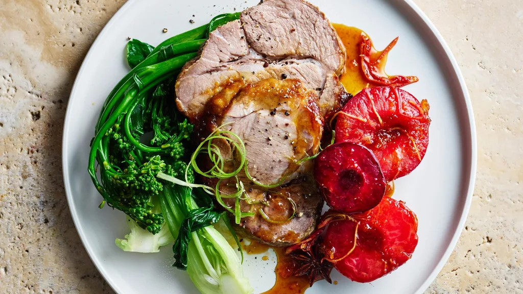 Slow-roasted pork neck with roast plums