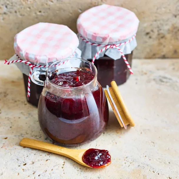 Three jars of plum jam