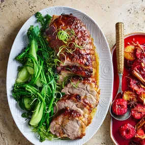 Slow-roasted pork neck with plums