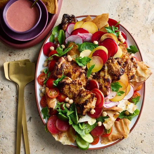 Yoghurt chicken with plum & chickpea salad