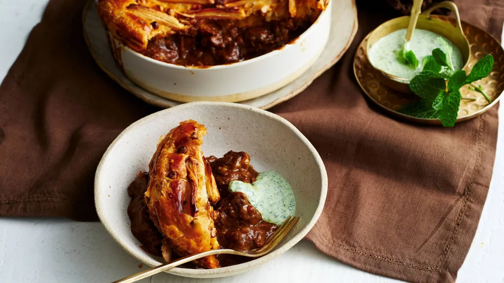 Beef curry pie serving in a bowl